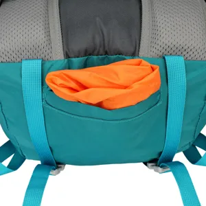 Waterproof 40L hiking backpack detail featuring durable teal fabric and convenient storage pocket.