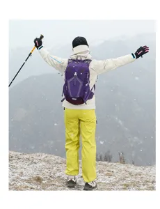 Outdoor hiking backpack detail view showing functional straps and ergonomic design in snowy mt.