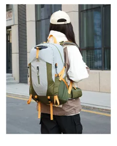 Detail view of nylon outdoor hiking backpack with adjustable straps and multi-color design.