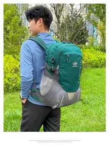 Outdoor mountaineering backpack detail showing large capacity, breathable straps and green design.