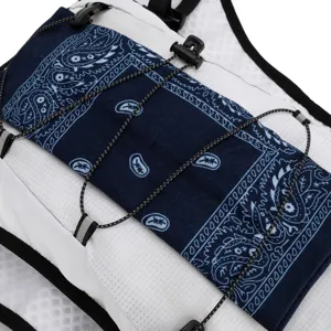 Professional outdoor running backpack hydration vest with blue paisley pattern & cords.