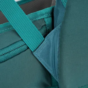 Backpack strap reinforcement stitching detail, durable hiking backpack webbing close-up shot.