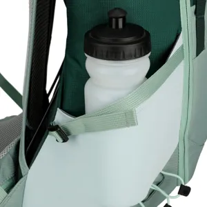 Detail view of the backpack side pocket with bottle holder, durable nylon outdoor gear.