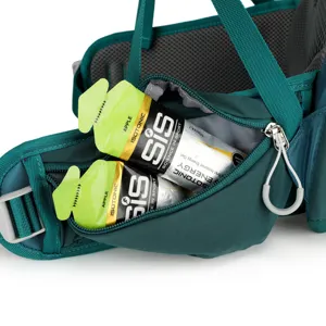 Detailed close-up of the backpack hip belt pocket in dark green, ideal for hiking gear.