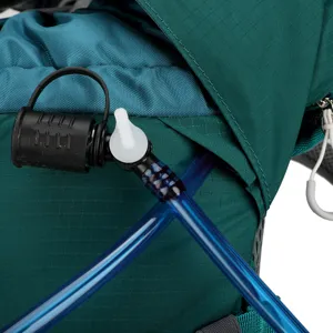 Outdoor hiking backpack water system detail close up, durable hydration pack accessories.