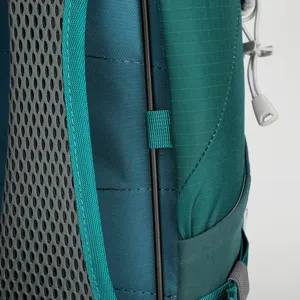Suspension mountaineering backpack mesh back panel and frame detail for hiking sports.