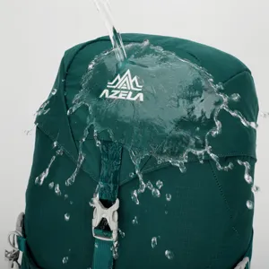 Green waterproof outdoor backpack top detail shot, showing excellent water resistant performance.