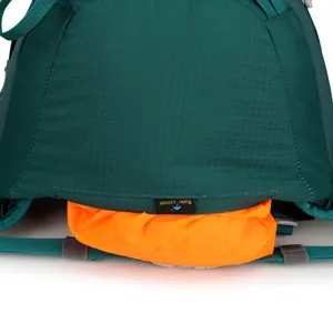 Hiking backpack detail bottom rain cover storage compartment green fabric outdoor sports gear