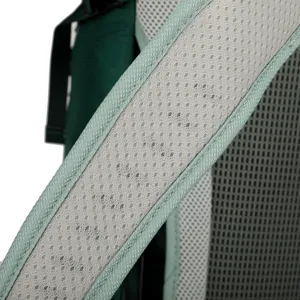 Detailed close-up of breathable mesh shoulder strap for outdoor hiking backpack.