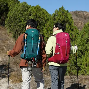Professional outdoor hiking backpack with suspension frame for men and women trekking.