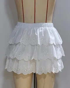 White tiered eyelet lace ruffle mini skirt detail, summer fashion short skirt for women.