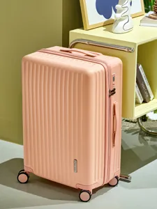 Stylish pink hardside luggage suitcase with durable vertical stripes, TSA lock and wheels.