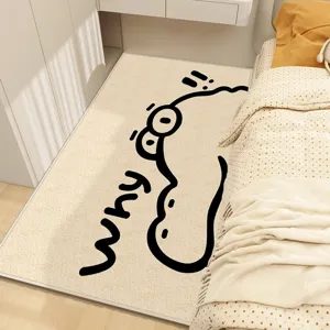 Close-up detail of the cute cartoon alligator plush bedside rug showing soft texture.