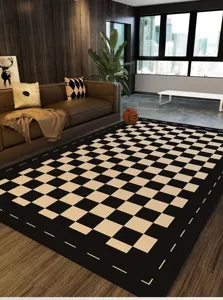 Detailed view of modern black and white checkerboard rug for living room floor decor.