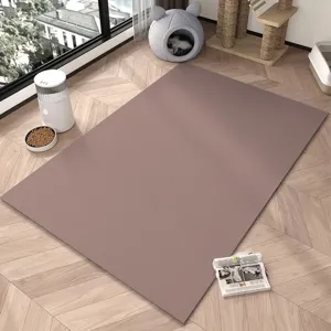 Detailed view of the solid color non-slip pet floor mat placed in a cozy living room.