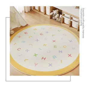 Details of the soft round kids rug with colorful alphabet letters and cozy yellow border design.