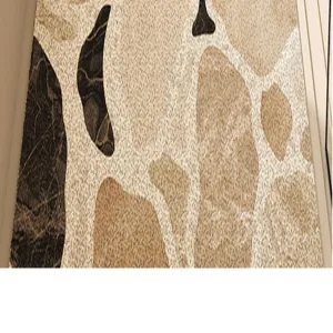 Modern minimalist loop wire bathroom floor mat with abstract stone pattern, non-slip and durable.