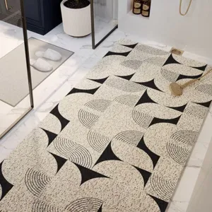 Detail shot of the Wabi-sabi style hollow non-slip shower mat with geometric black patterns.
