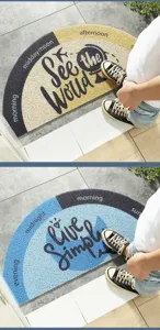 Detail view of half-circle doormat with English print, durable coiled vinyl material for entryway.