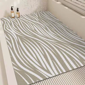 Modern minimalist bathroom non-slip mat with abstract wave pattern, easy to clean floor mat.
