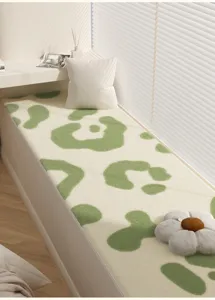 Zacht pluche erker matje met groen melkpatroon, comfortabel zacht kussen voor thuisdecoratie.