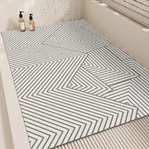 Modern minimalist bathroom anti-slip mat detail showing geometric pattern and hollow structure.