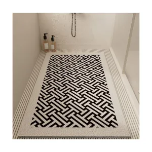 Bathroom anti-slip mat with black and white geometric pattern, waterproof and fast drying for shower.