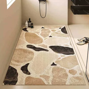 Modern minimalist bathroom floor mat, non-slip hollow drainage loop mat with stone pattern.