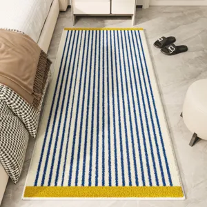 Faux cashmere striped rug, blue and white vertical stripes with yellow ends, soft bedroom carpet.
