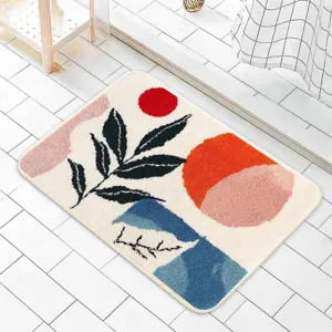 Dettaglio del tappeto da bagno botanico astratto morbido con texture in cashmere e design moderno.