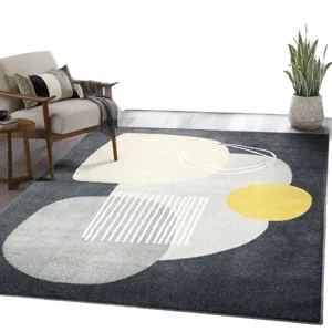 Modern abstract geometric living room rug with grey and yellow circular pattern.