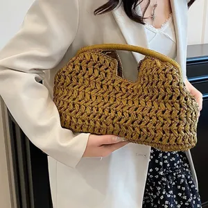 Woven straw clutch bag for women, vintage shell design summer beach handbag and purse.