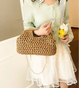 Detailed view of the vintage straw woven shell handbag with chain, perfect for casual beach style.
