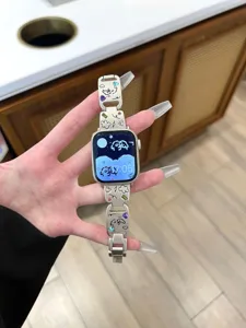 Metal watch band compatible with Apple Watch, featuring cute doodle dogs and colorful rhinestones.