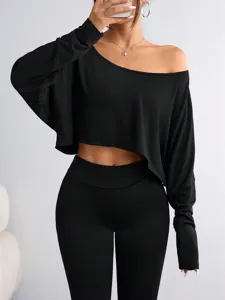 Black off-shoulder crop top and matching slim pants set for women stylish streetwear.