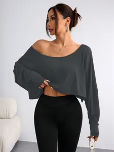 Detailed view of women casual off shoulder long sleeve crop top showing fabric and fit.