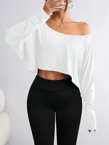 Close-up detail of the stylish off-shoulder long sleeve crop top showcasing its fit and fabric.