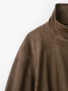 Brown faux suede jacket detail shot, stand collar, soft texture, fine stitching.