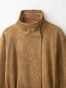 Brown suede jacket detail, high collar design, autumn women winter warm outerwear close up.