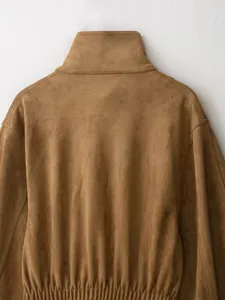 Brown suede jacket back detail showing high collar and elastic hem texture craftsmanship.