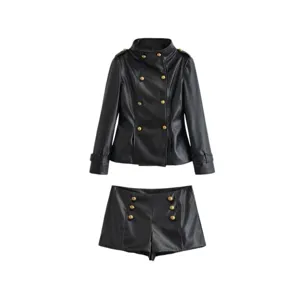 Detailed view of women black faux leather stand collar jacket and matching shorts set with gold buttons