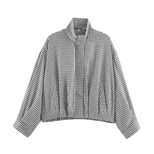 Checkered high collar zip jacket detail, cropped loose fit design with elastic hem and pockets.