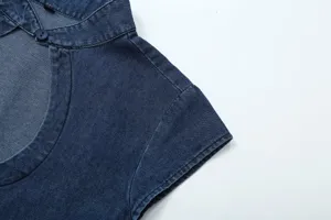 Detailed view of women's vintage cutout sleeveless denim top with elegant collar button.