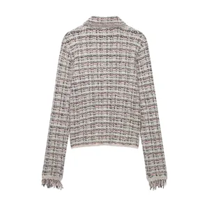 Detailed view of the stylish tweed-style knitted cardigan with lapel and fringe cuffs for women.