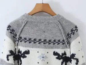 Retro reindeer jacquard knit sweater, cozy crewneck winter top for women, casual stylish wear.