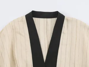 New Chinese style women's top detail, elegant contrast collar design with fine stripes.