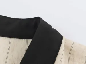 Close-up detail of the new Chinese style contrast collar top, showing fine stripe fabric.