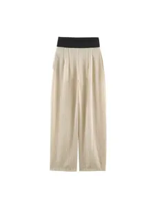 High waist wide leg pants with contrasting black waistband and chic vertical stripes for women.