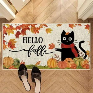 Autumn black cat and pumpkin doormat detail view, festive entryway seasonal decor mat.