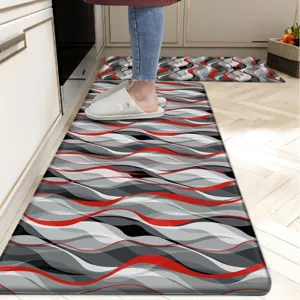 Kitchen floor mat set with abstract red and grey wave design, durable non-slip kitchen rug.